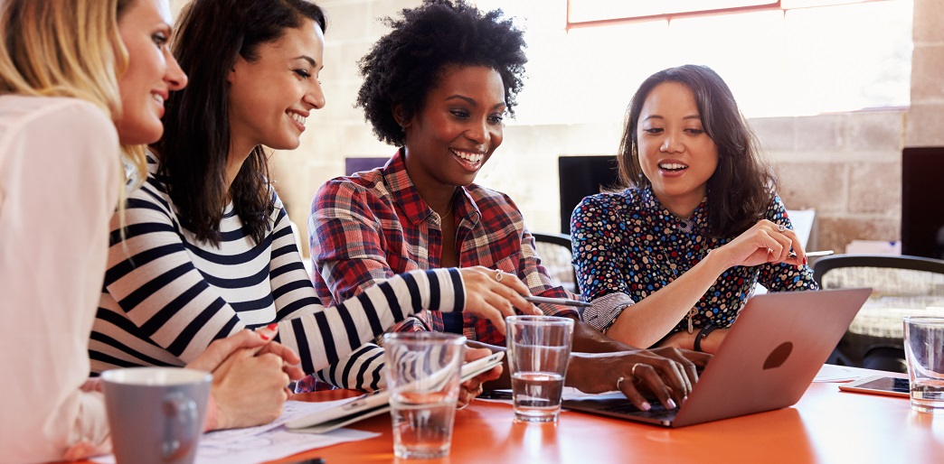 Image of adults talking and laughing together