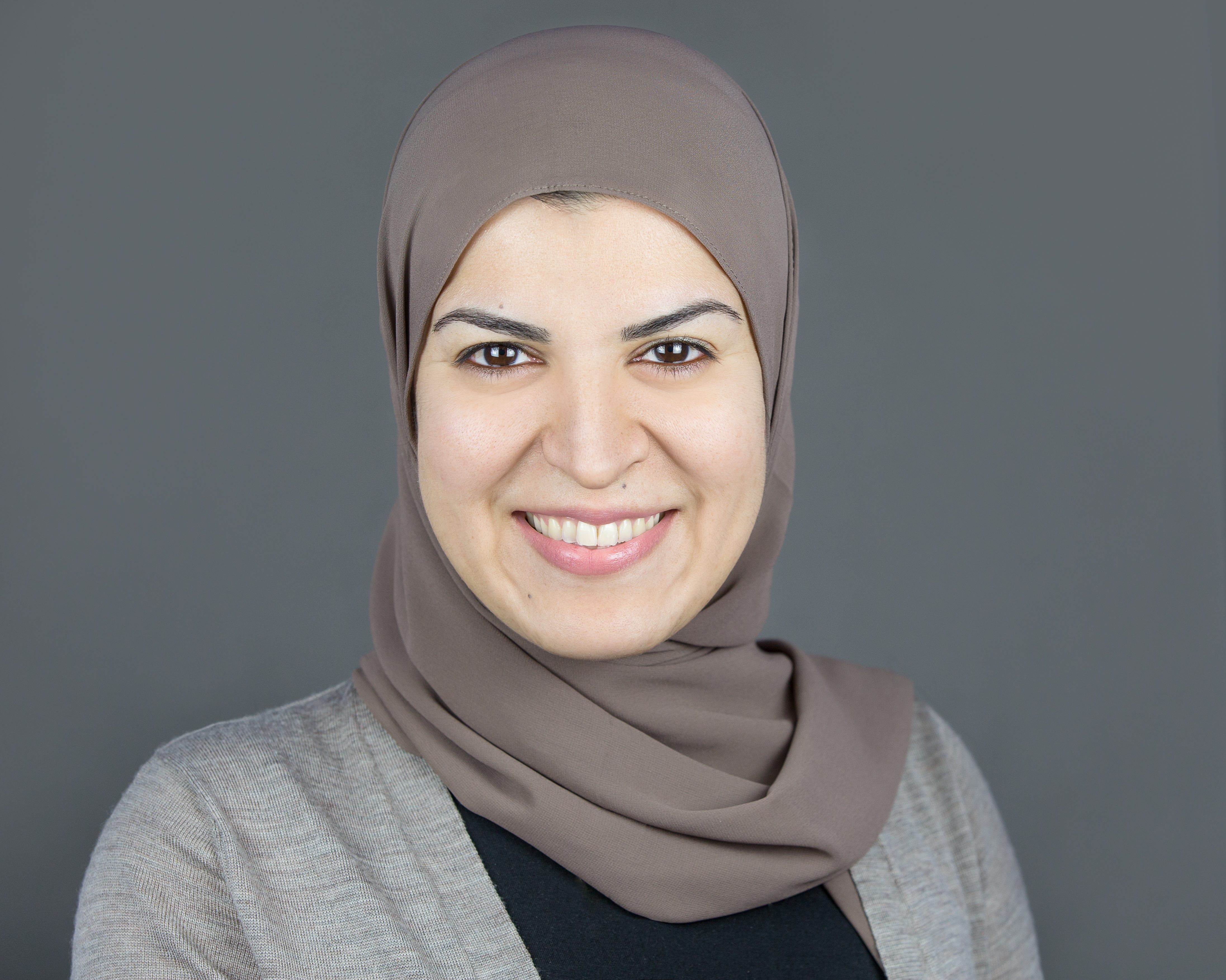 Headshot of featured member, Reem Ali