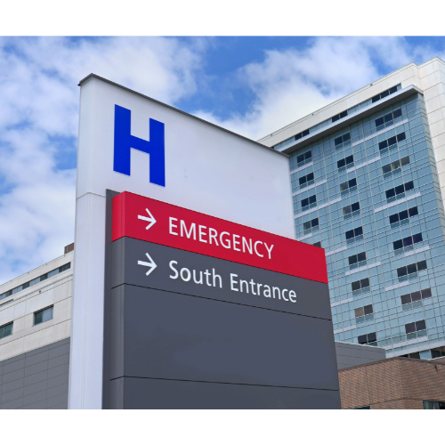Photo of hospital sign in front of hospital