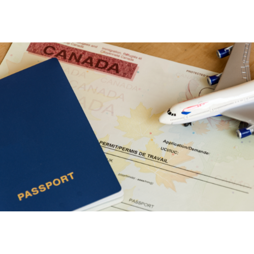 Canadian work permit paper document and passport top view
