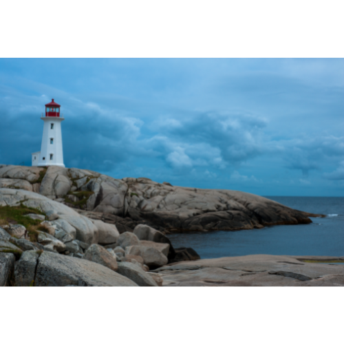 White lighthouse on rocks